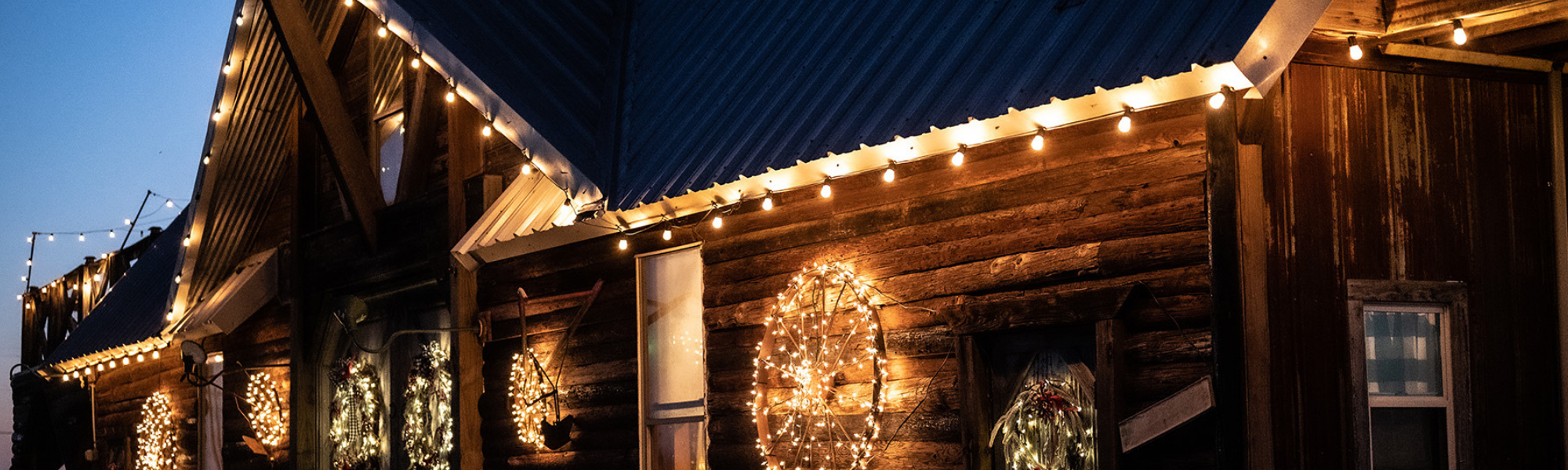 barn exterior with Christmas lights
